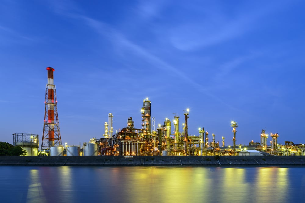 Oil refineries line a river in Yokkaichi, Japan. The city has been a center for the chemical industry since the 1930s.